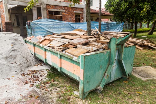 Site clearance equipment in action in Surbiton
